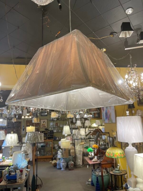 Modern hanging light with geometric fabric shade