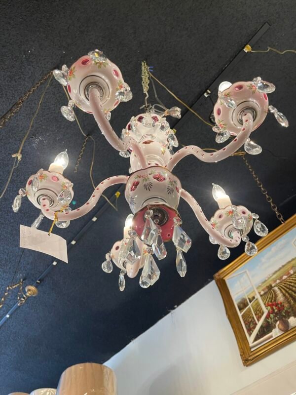 “Romantic porcelain chandelier with teardrop prisms”