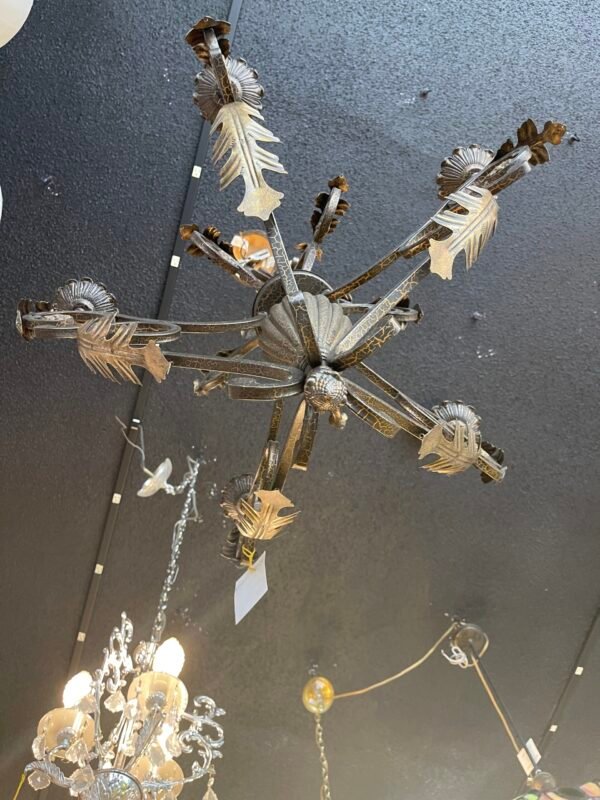 Underside view of rustic wrought iron chandelier
