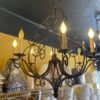 Overhead view of iron chandelier candle sockets