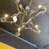 "French country chandelier with wrought iron frame"