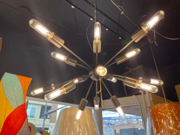 Modern brushed steel Sputnik chandelier with 12 tubular bulbs suspended from a central sphere