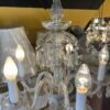 Clear glass arm chandelier with crystal drops