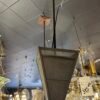 "Metal pendant with mesh panels"