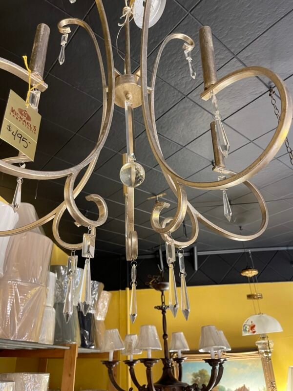 Transitional chandelier with hanging crystals