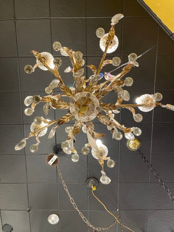 View from below of floral chandelier showcasing full spread and detail