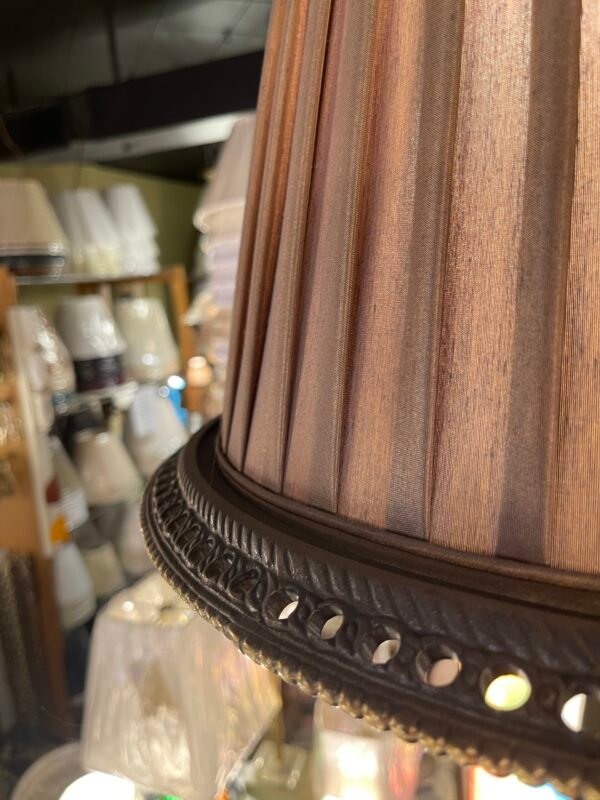 Bottom trim detail of fabric lamp shade