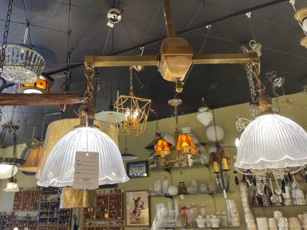 Bar-style pendant light in showroom setting