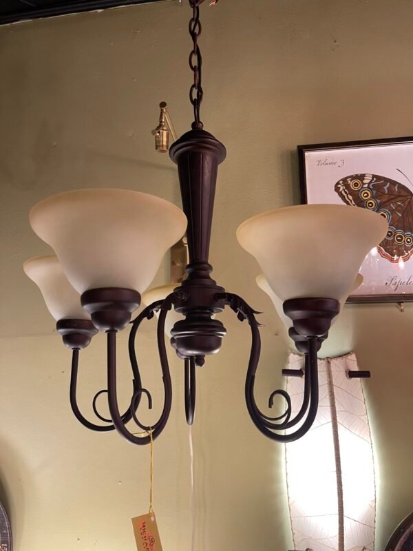 Traditional chandelier with curved arms and bell shades