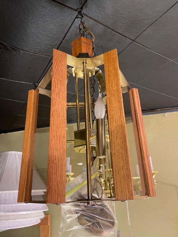 Lantern-style pendant light with oak frame