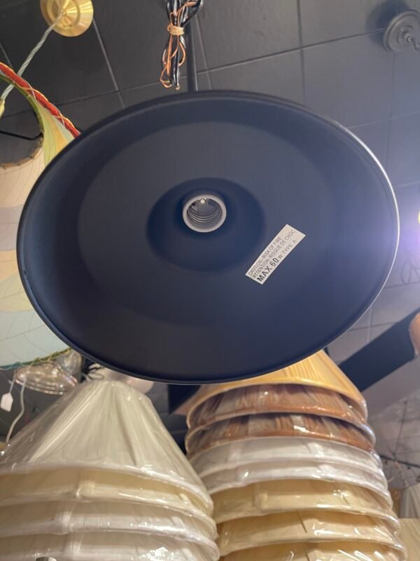Underside of black metal pendant fixture