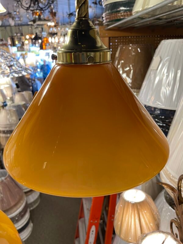 Amber glass pendant light with brass hardware