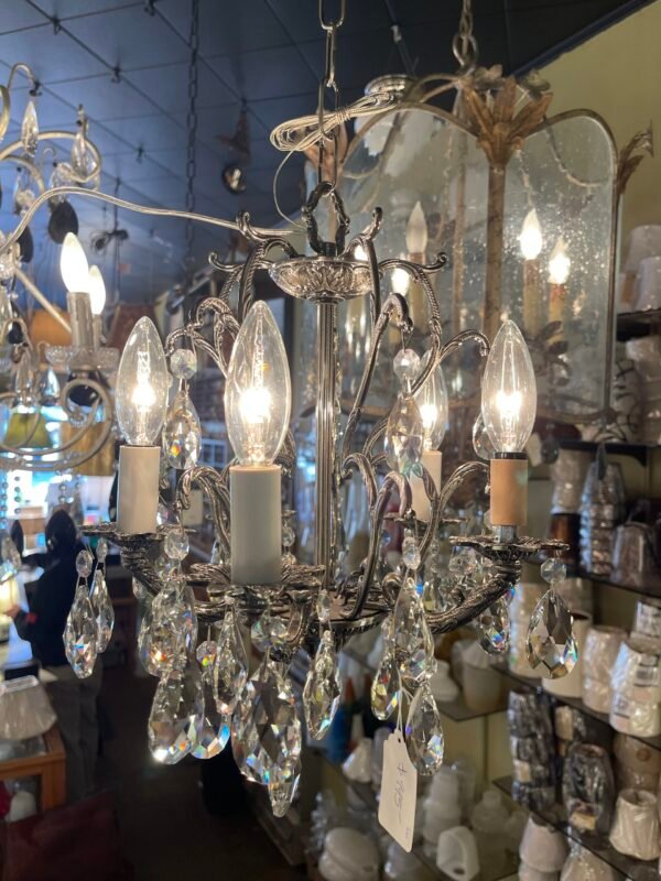 Silver crystal chandelier with teardrop prisms