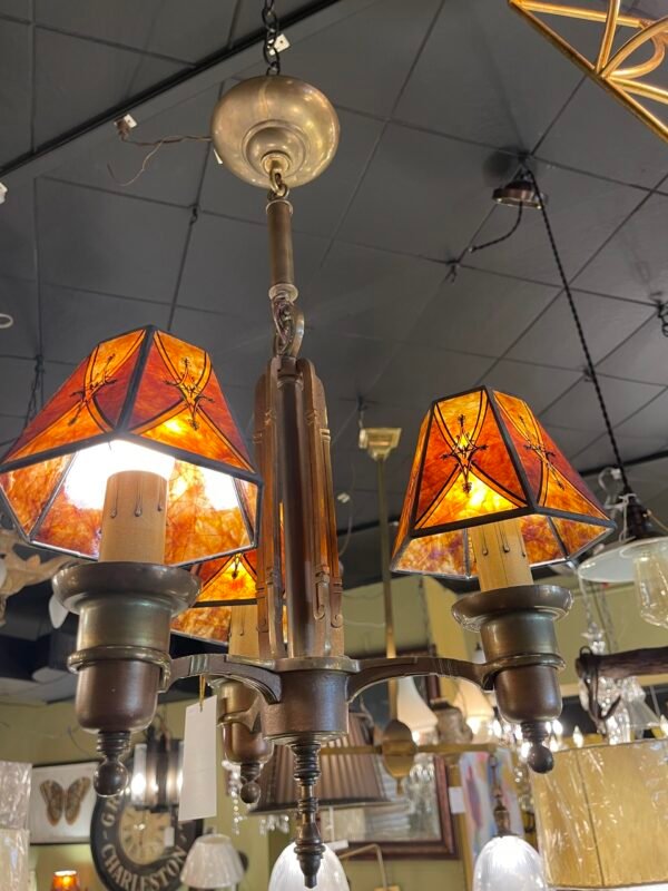 Amber panel chandelier with bronze arms