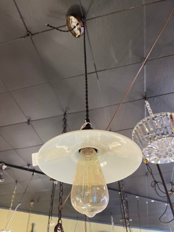 Underside of vintage enamel light fixture