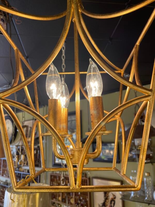 Close-up of gold chandelier with candles