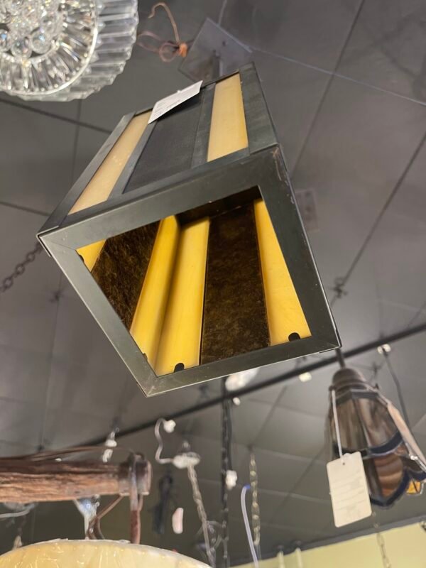 Hanging geometric pendant in dark metal
